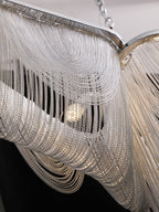 Solara Chandelier Franges Dorées - Neutralighting