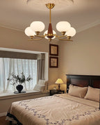 Lustra Chandelier en Noyer avec Globes en Verre Opale - Neutralighting