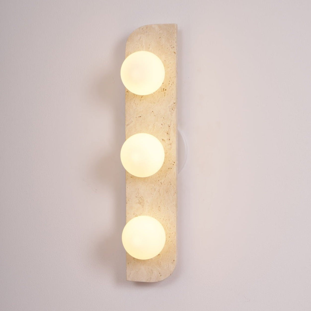 Zophaor Minimalist Travertine Plug-In Wall Light - Neutralighting