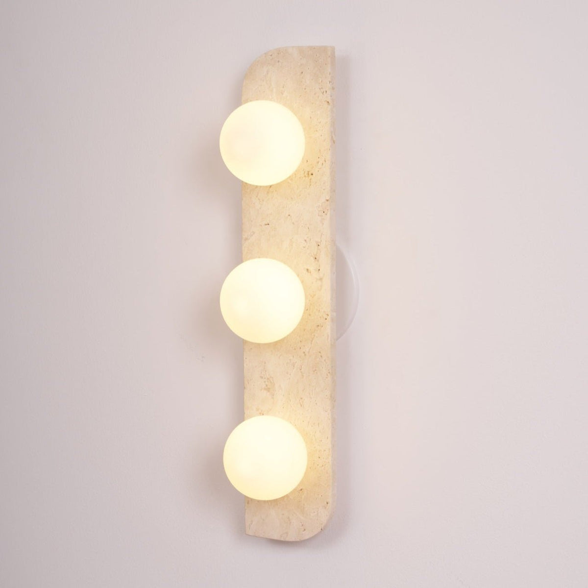 Zophaor Minimalist Travertine Plug-In Wall Light - Neutralighting