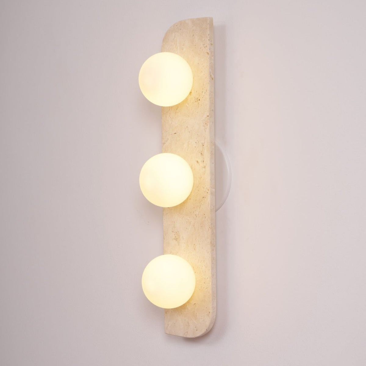 Zophaor Minimalist Travertine Plug-In Wall Light - Neutralighting