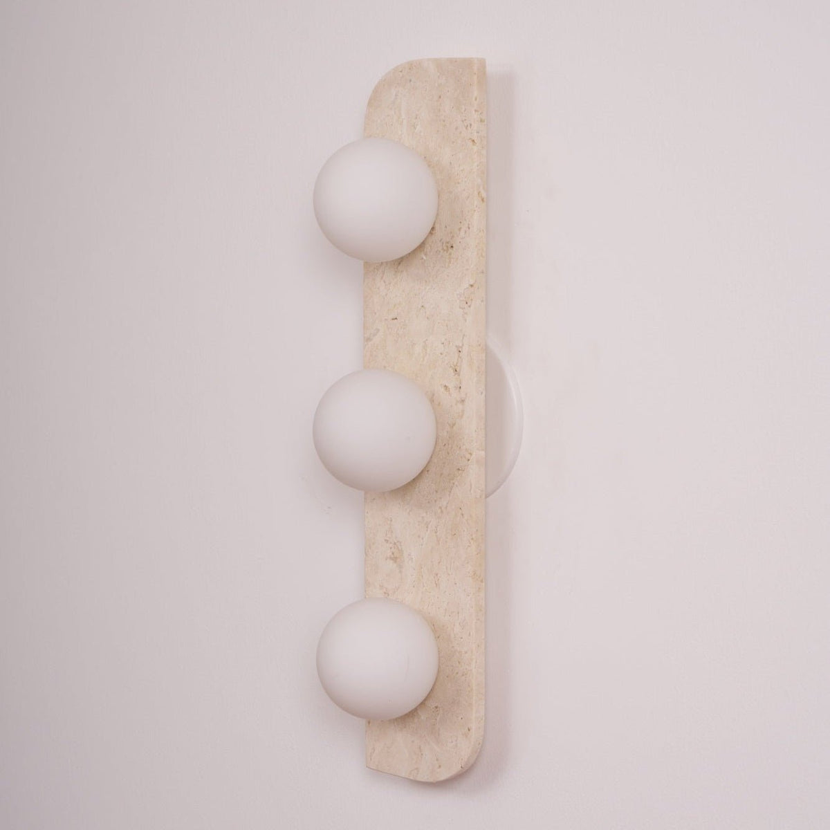 Zophaor Minimalist Travertine Plug-In Wall Light - Neutralighting