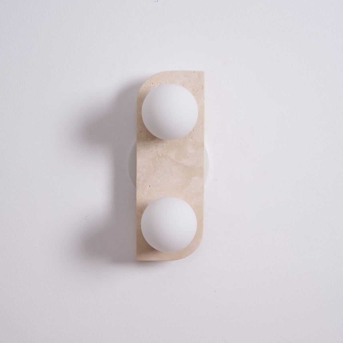 Zophaor Minimalist Travertine Plug-In Wall Light - Neutralighting