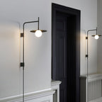 Edan Swing Arm Plug-in Glass Wall Lamp - Neutralighting