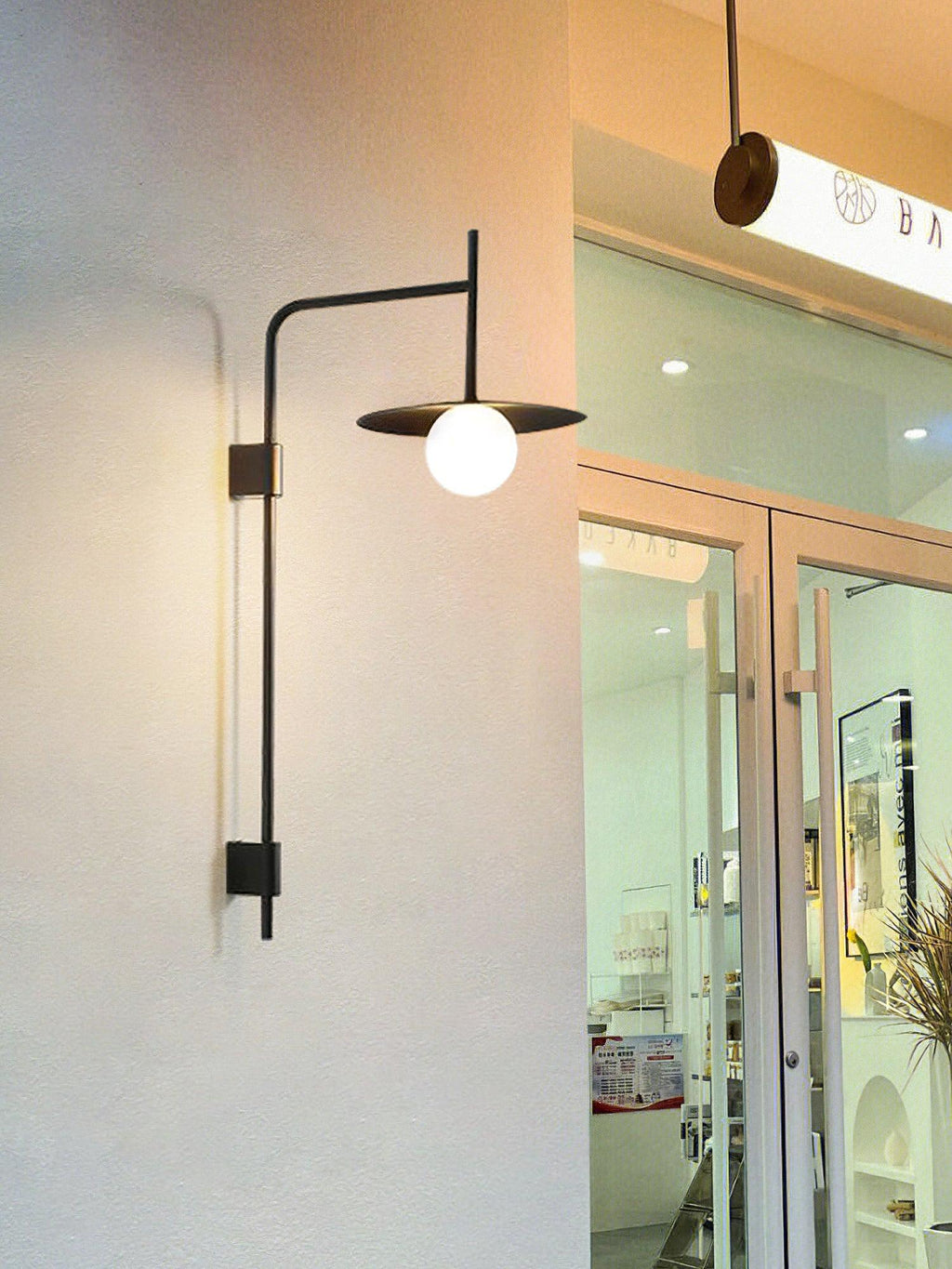 Edan Swing Arm Plug-in Glass Wall Lamp - Neutralighting