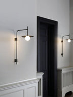 Edan Swing Arm Plug-in Glass Wall Lamp - Neutralighting