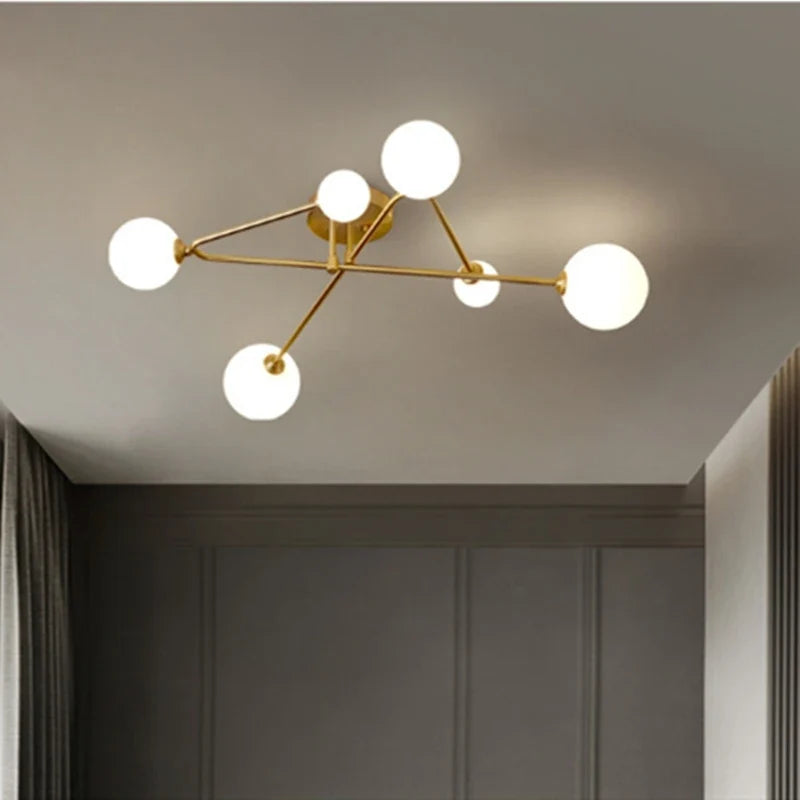 Plafonnier moderne en verre doré design nordique élégant intérieur décoratif Gautier Intervalle - Esprit Épuré & Harmonie Intérieure