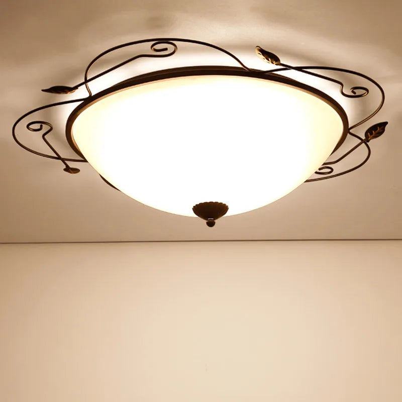 Plafonnier moderne en verre style industriel pour éclairage décoratif Eulalie Volute - Reflets Subtils & Décor Raffiné