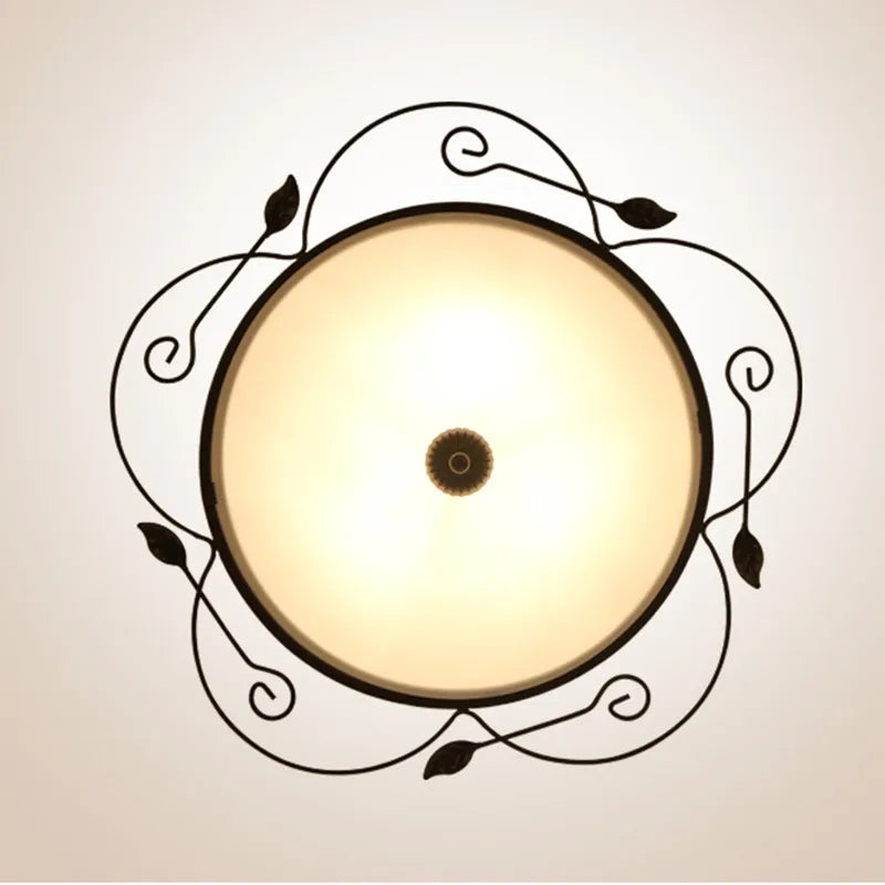 Plafonnier moderne en verre style industriel pour éclairage décoratif Eulalie Volute - Reflets Subtils & Décor Raffiné