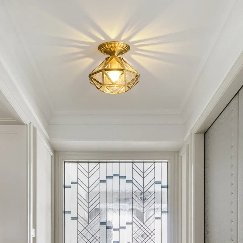 Plafonnier créatif en cuivre pour intérieur moderne et élégant Lorène Dessin - Le Charme du Verre dans le Décor