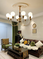 Lustra Chandelier Bras en Laiton Boules en Verre Dépoli - Neutralighting