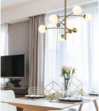 Lustra Chandelier en Laiton avec Poutre Verticale et Globe - Neutralighting