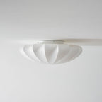 Solara Plafonnier Tissu Coquillage Sculptural Élégant - Neutralighting