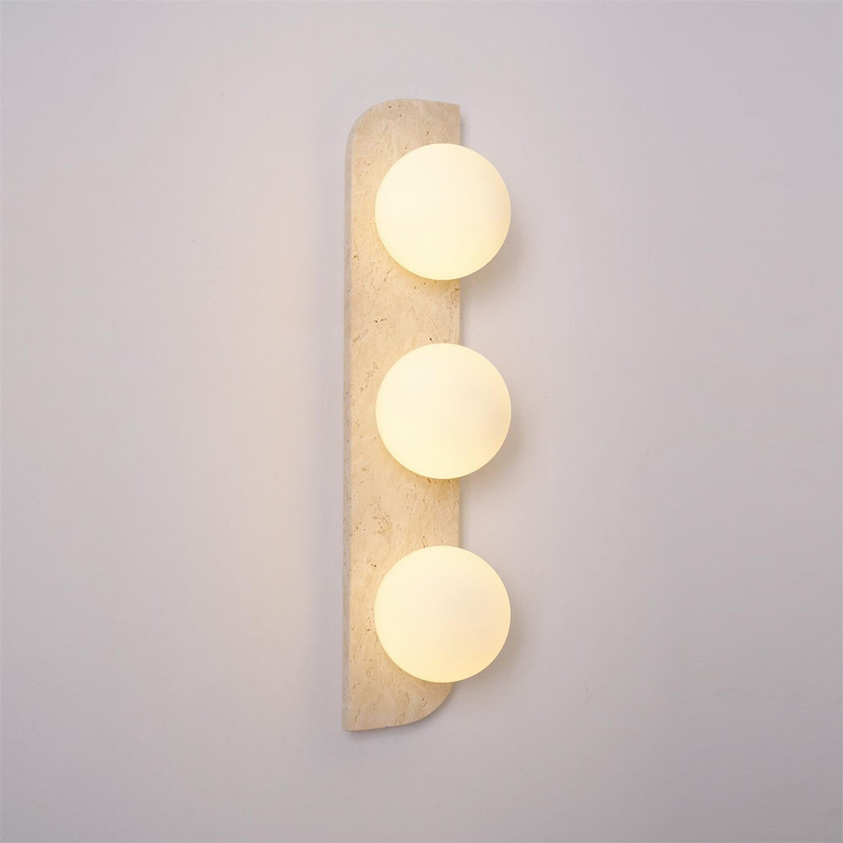 Zophaor Minimalist Travertine Plug-In Wall Light - Neutralighting