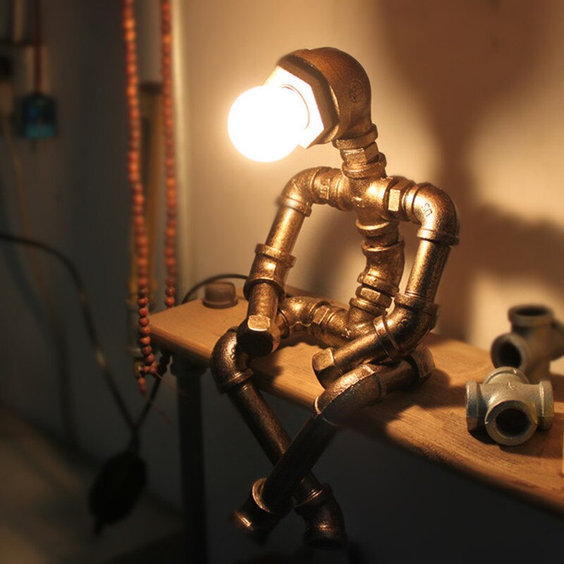 Lampe à poser industrielle LED figure robotique métallique Nile