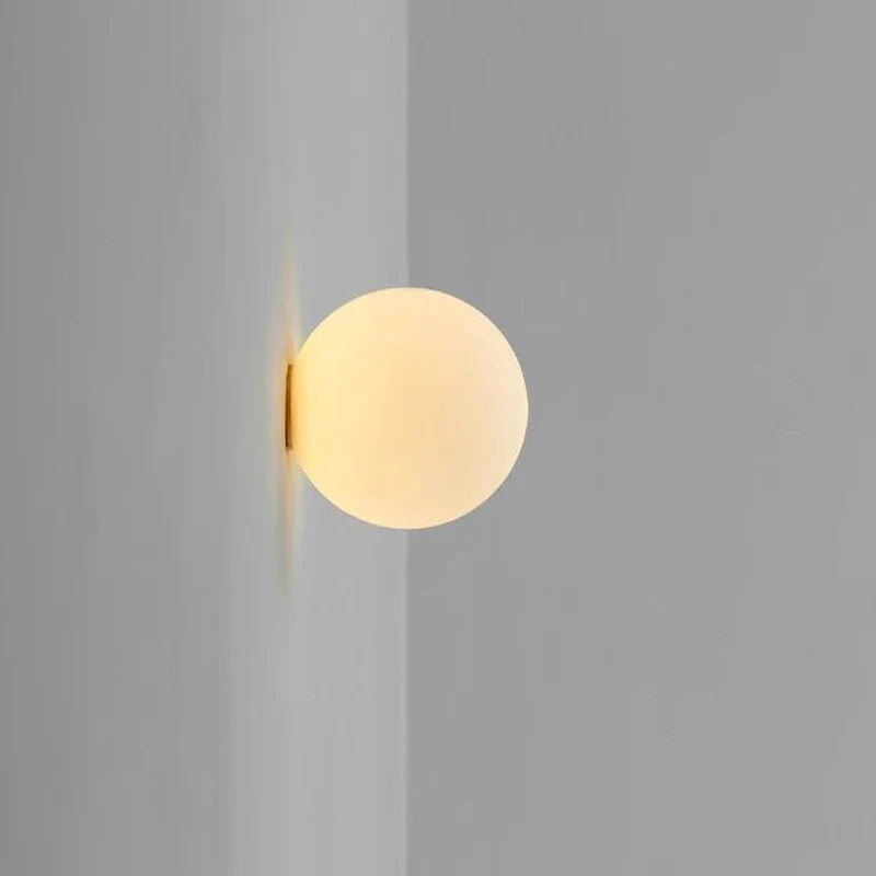 lampe boule de verre moderne avec base dissimulée pour divers usages