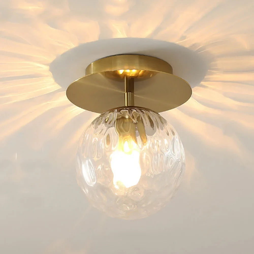 Plafonnier moderne en verre design pour un éclairage élégant Rosine Traverse - Jeux de Reflets & Harmonie Intérieure