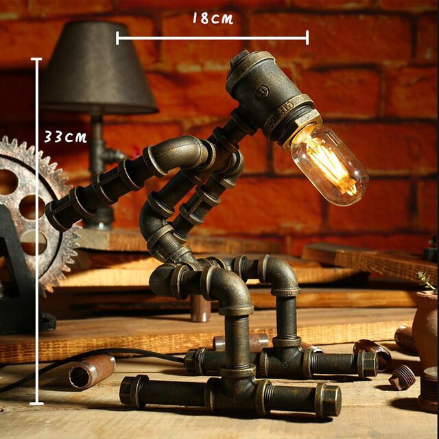 Lampe à poser industrielle LED figure robotique métallique Nile