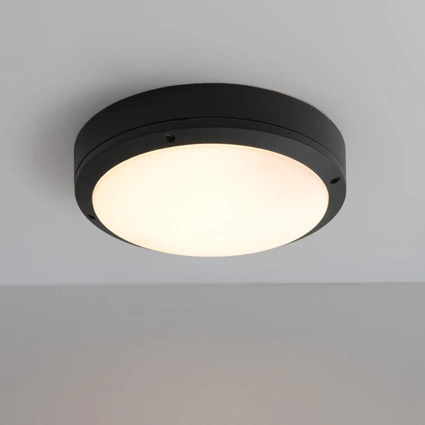 Plafonnier extérieur étanche pour éclairage de jardin et terrasse Célestin Courbe en Aluminium - Caractère & Élégance dans le Décor