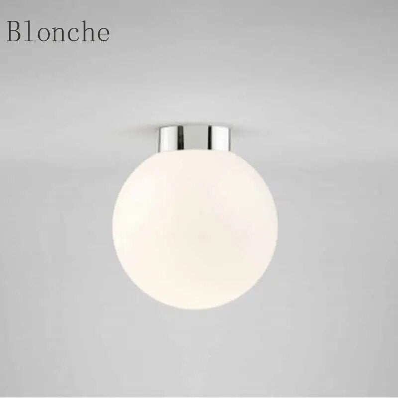 Plafonnier Led rond en forme de boule de verre Cybèle Reflet - Reflets Délicats & Élégance Visuelle