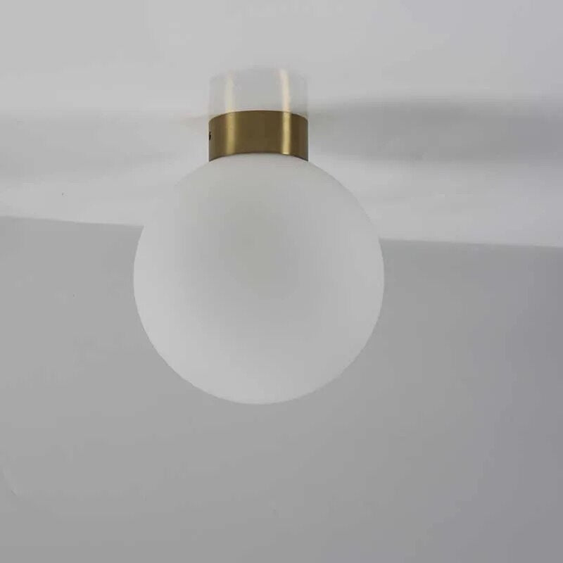Plafonnier Led rond en forme de boule de verre Cybèle Reflet - Reflets Délicats & Élégance Visuelle