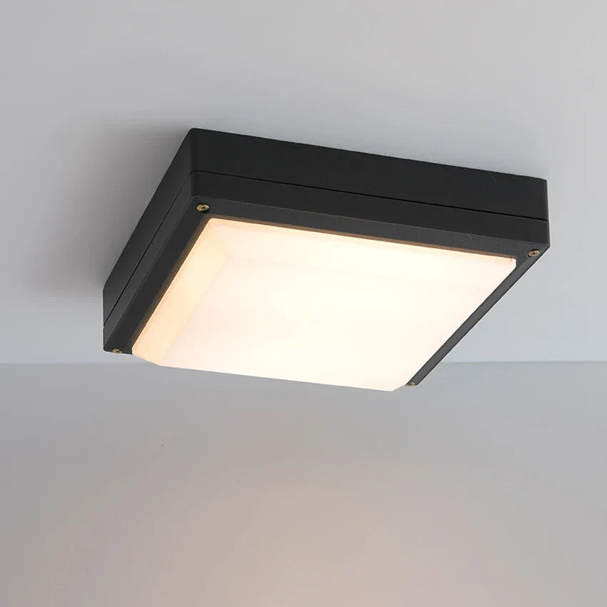 Plafonnier extérieur étanche pour éclairage de jardin et terrasse Célestin Courbe en Aluminium - Caractère & Élégance dans le Décor