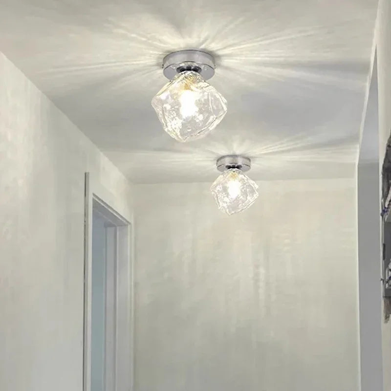 Plafonnier moderne en verre pour décoration intérieure élégante Adélie Volute - Jeux de Reflets & Harmonie Intérieure