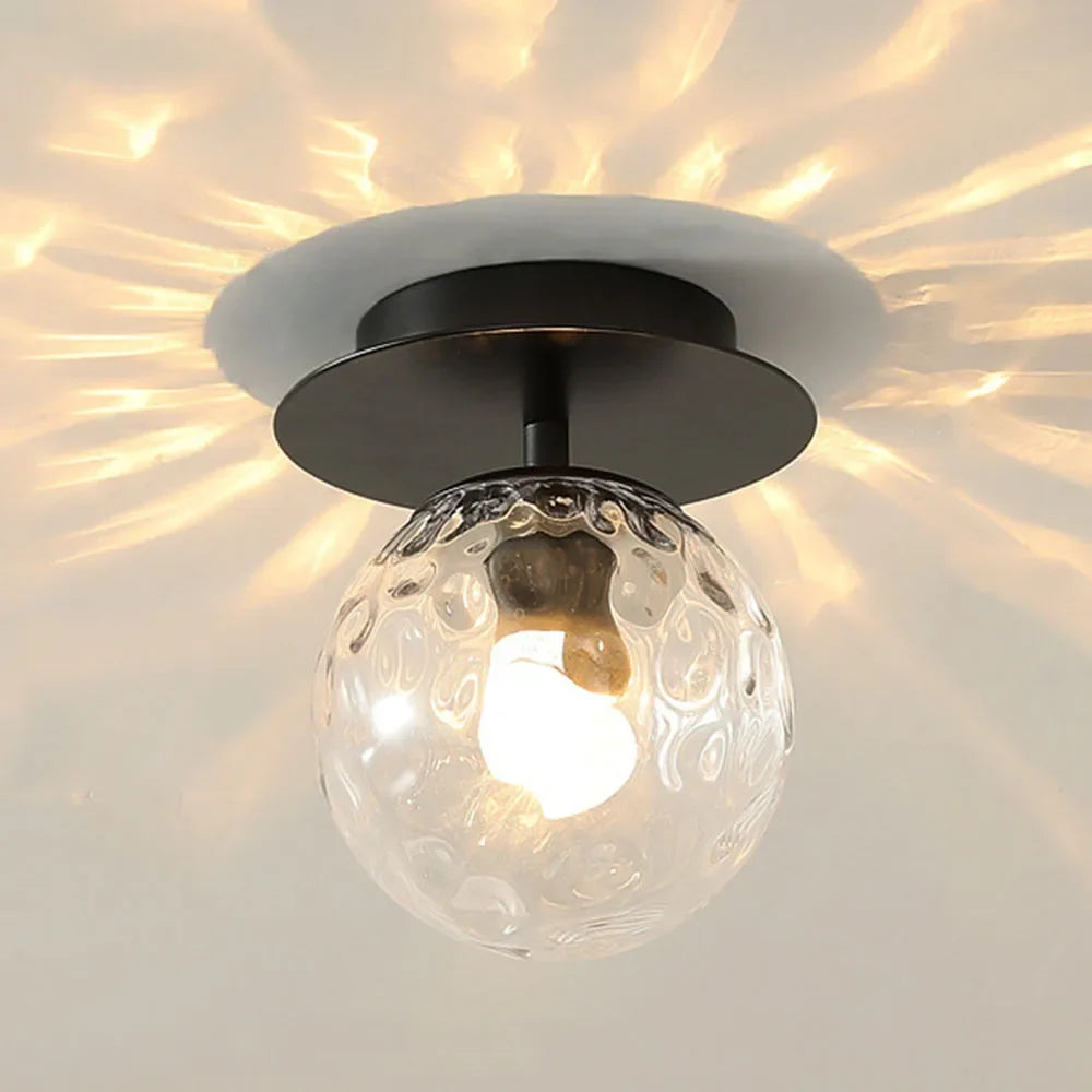 Plafonnier moderne en verre design pour un éclairage élégant Rosine Traverse - Jeux de Reflets & Harmonie Intérieure