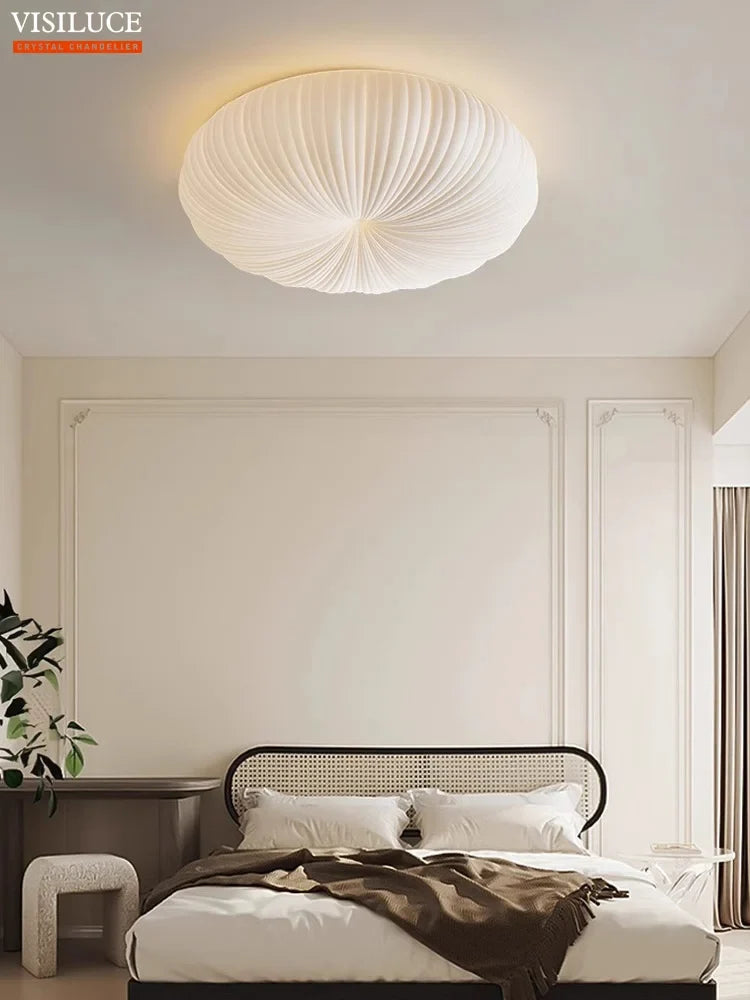 Plafonnier led moderne abat jour citrouille luminaire à intensité variable Léon Courbe - Présence Moderne & Harmonie Intérieure