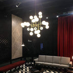 Lustra Chandelier Stilnovo en Laiton Noir et Verre - Neutralighting