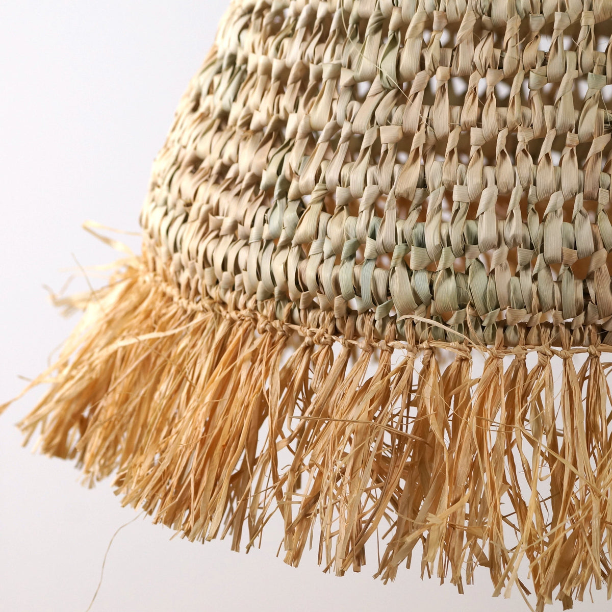 Suspension boule en palme et raphia