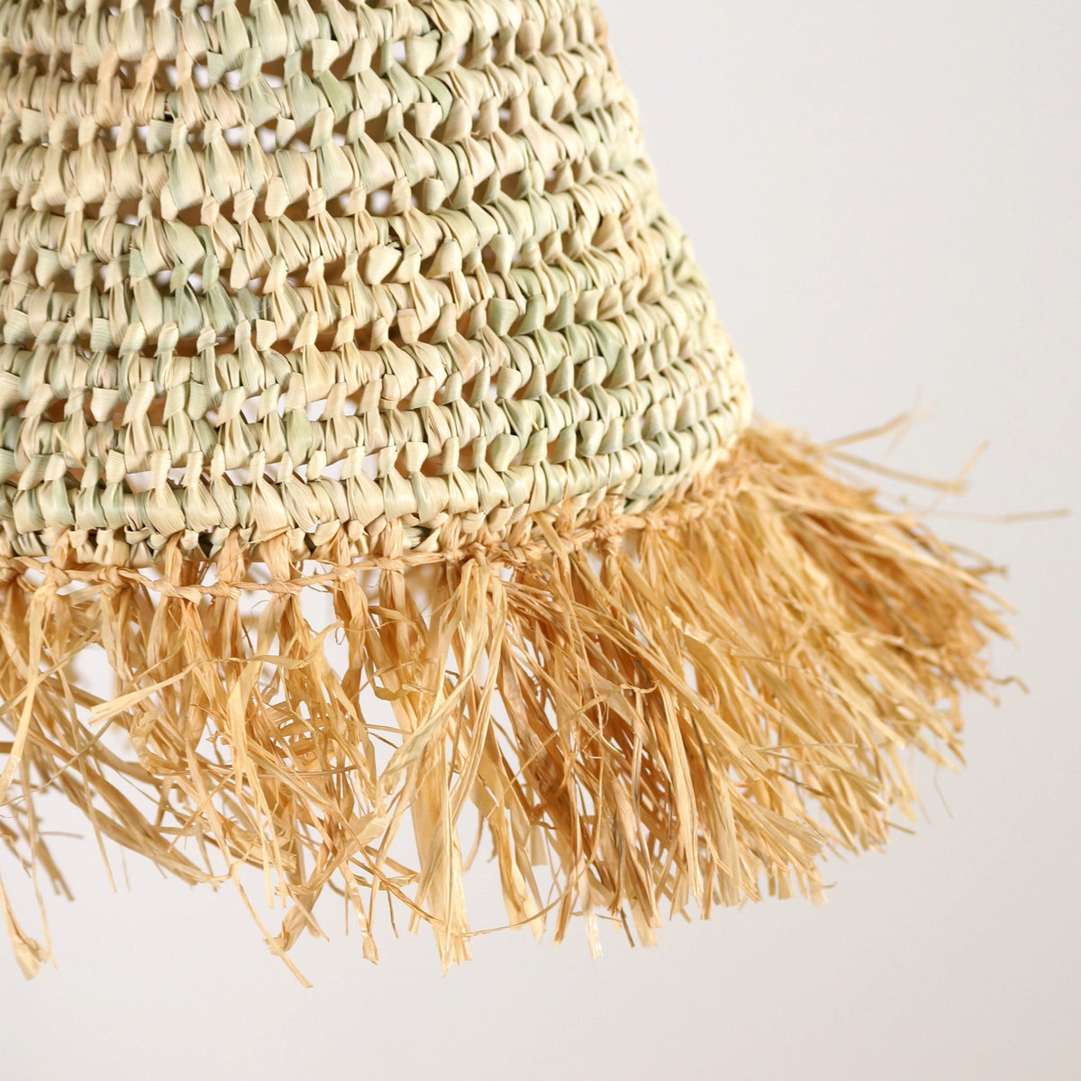Suspension boule en palme et raphia