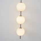Ilraeia Vertical Globe Plug-in Wall Lamp - Neutralighting