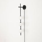 Ilraeia Vertical Globe Plug-in Wall Lamp - Neutralighting