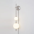 Ilraeia Vertical Globe Plug-in Wall Lamp - Neutralighting