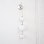 Ilraeia Vertical Globe Plug-in Wall Lamp - Neutralighting