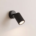 Applique murale — Spot orientable noire cannelée avec interrupteur
