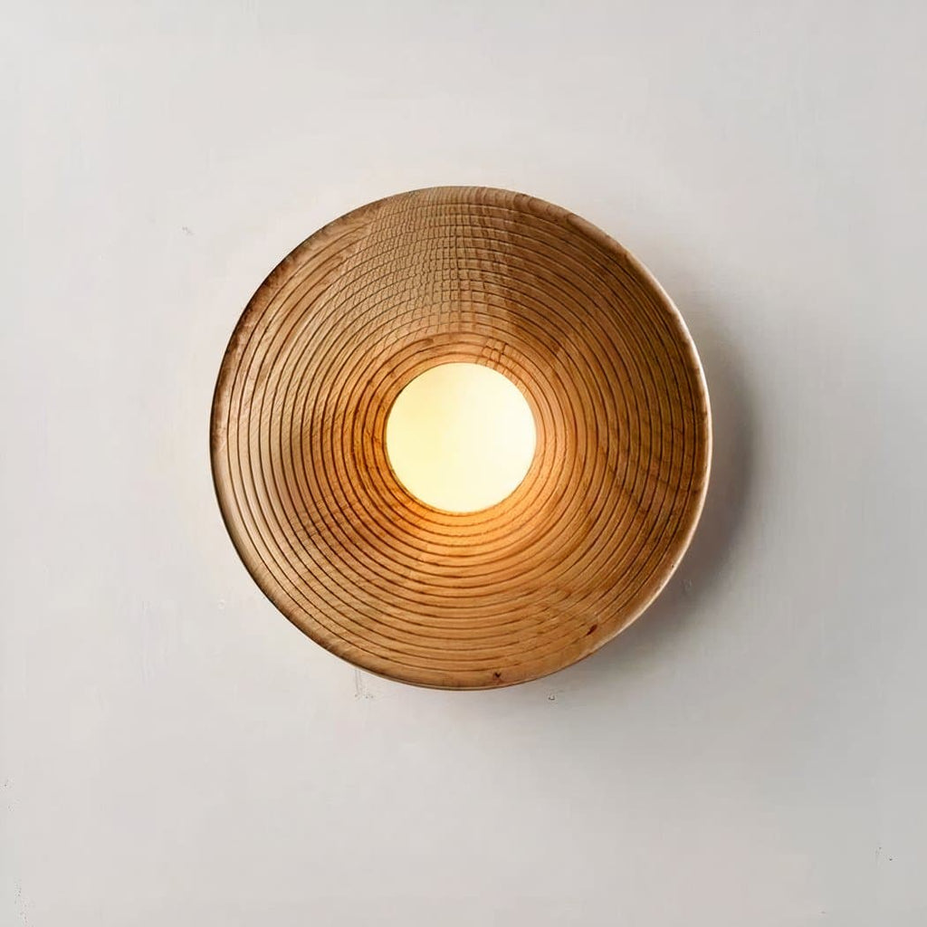 Applique murale ronde en bois dans le style bohème – Évarine Courbe
