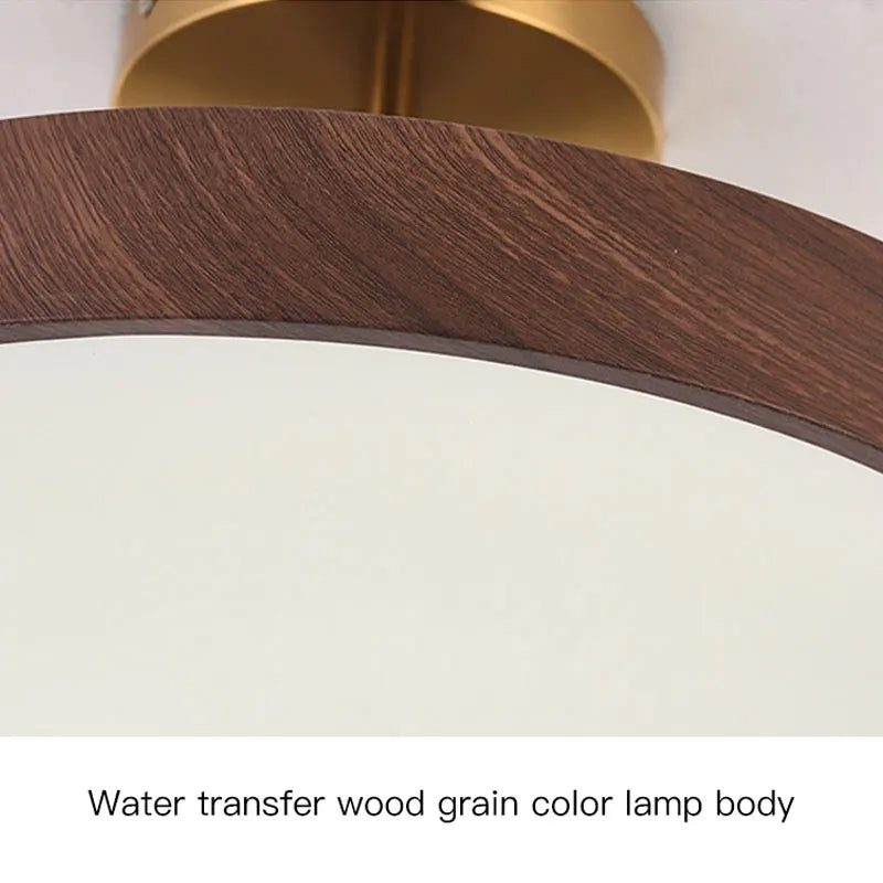 Plafonnier moderne rond imitation bois pour intérieur élégant Aurore Traverse - Une Note Singulière dans le Décor