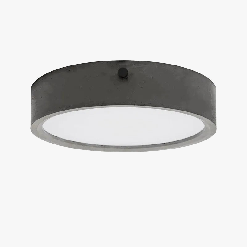 Plafonnier rond en ciment pour salon Mélanie Clairval - Courbes Douces & Décor Équilibré