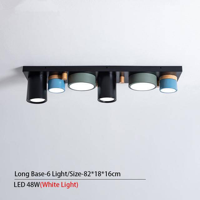 Plafonnier design avec plusieurs spots cylindriques colorés à LED Isaure Nuance - Géométrie & Élégance Visuelle