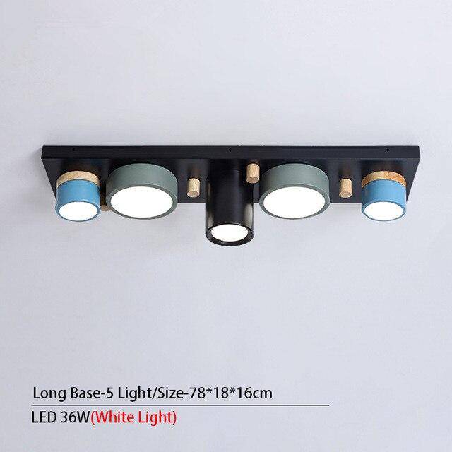 Plafonnier design avec plusieurs spots cylindriques colorés à LED Isaure Nuance - Géométrie & Élégance Visuelle
