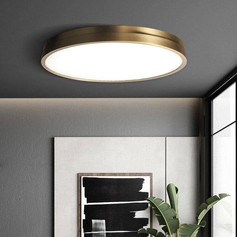 Plafonnier design LED arrondi ultra fin et doré Loft Alix Interlude en Cuivre - Une Présence Décorative Raffinée