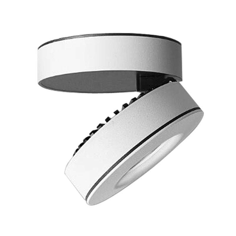 Spot moderne LED ronde et rotatif à 355° Manuel Nora Envol - Courbes Douces & Décor Équilibré