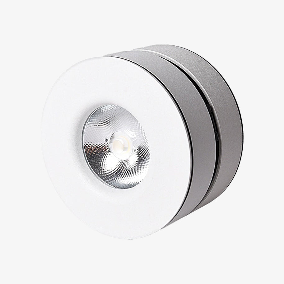 Spot moderne LED ronde et rotatif à 355° Manuel Nora Envol - Courbes Douces & Décor Équilibré